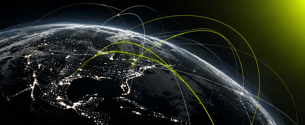 Earth at night with glowing lime data arcs